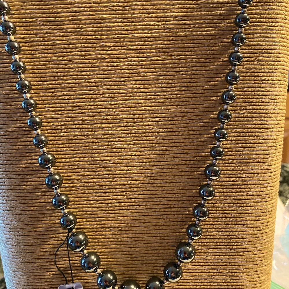 24” graduated genuine stone necklace with safety catch closure.